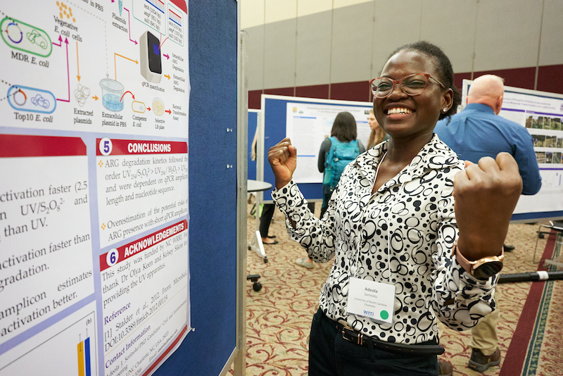 Adeola Sorinolu presents her poster at the 2022 Annual Conference presentation reception. 